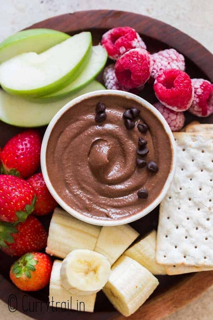 healthy dessert hummus platter with fruits and crackers