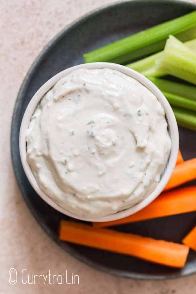 thick homemade blue cheese dip with veggies on side