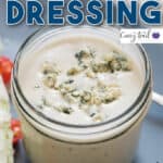 creamy homemade blue cheese dressing in jar with text overlay