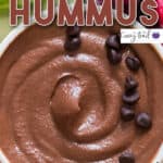 smooth chocolate hummus served with fruits and crackers on wooden platter with text overlay