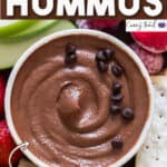 smooth chocolate hummus served with fruits and crackers on wooden platter with text overlay