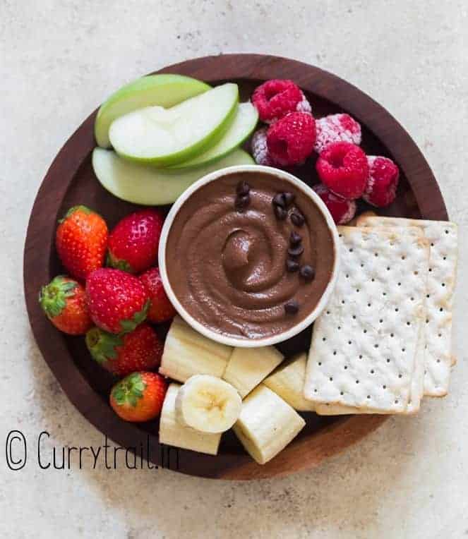 healthy dessert hummus platter with fruits and crackers