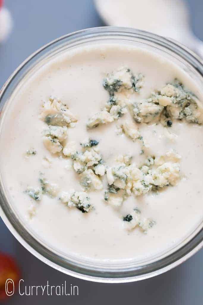 close up view of blue cheese dressing in a jar