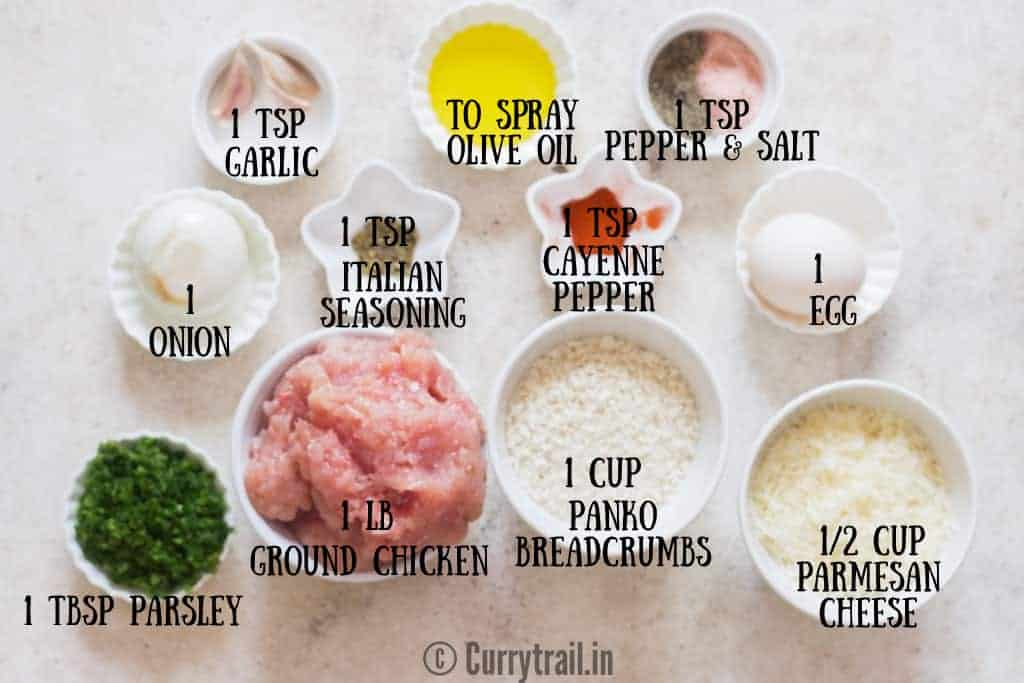 all ingredients for baked chicken meatballs on white board