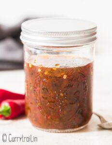 jar filled with jalapeno jelly aka hot pepper jelly