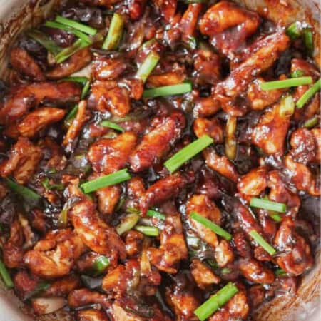 close up view of Mongolian chicken in skillet