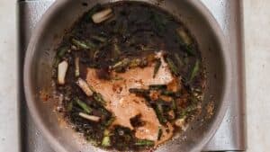Mongolian chicken sauce in skillet