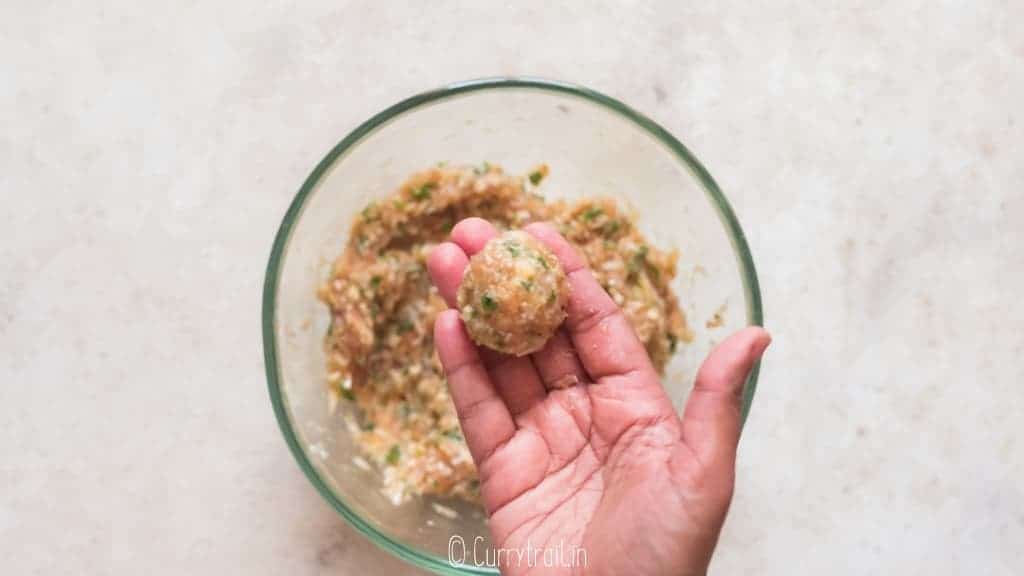 shaping meatballs to make baked chicken meatballs