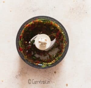 dicing jalapeno peppers in food processor to make jalapeno jelly