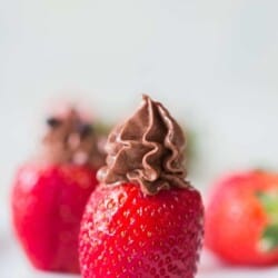 chocolate cheesecake stuffed strawberries on plate