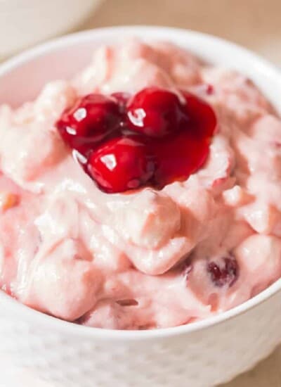 close up cherry salad in ceramic bowl
