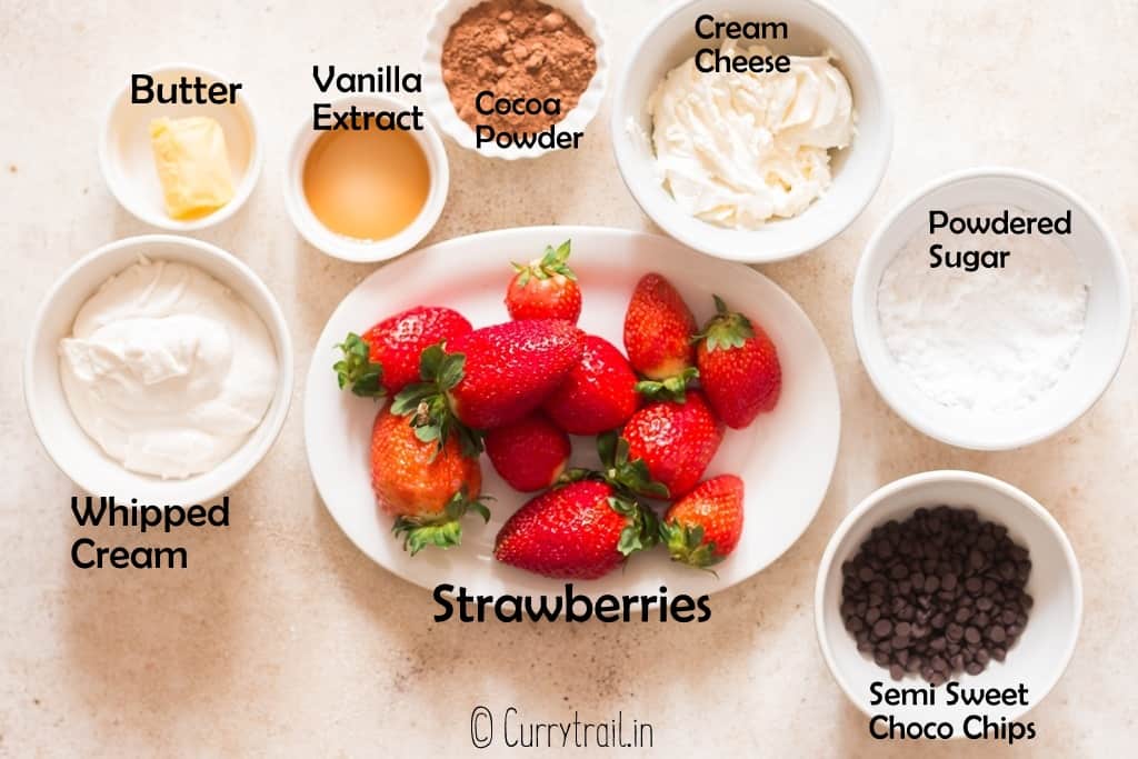 all ingredients for chocolate cheesecake stuffed strawberries on board