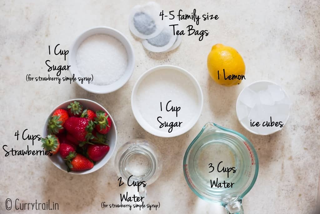 all ingredients for strawberry tea recipe on board