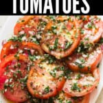 marinated tomatoes salad on white plate with text overlay