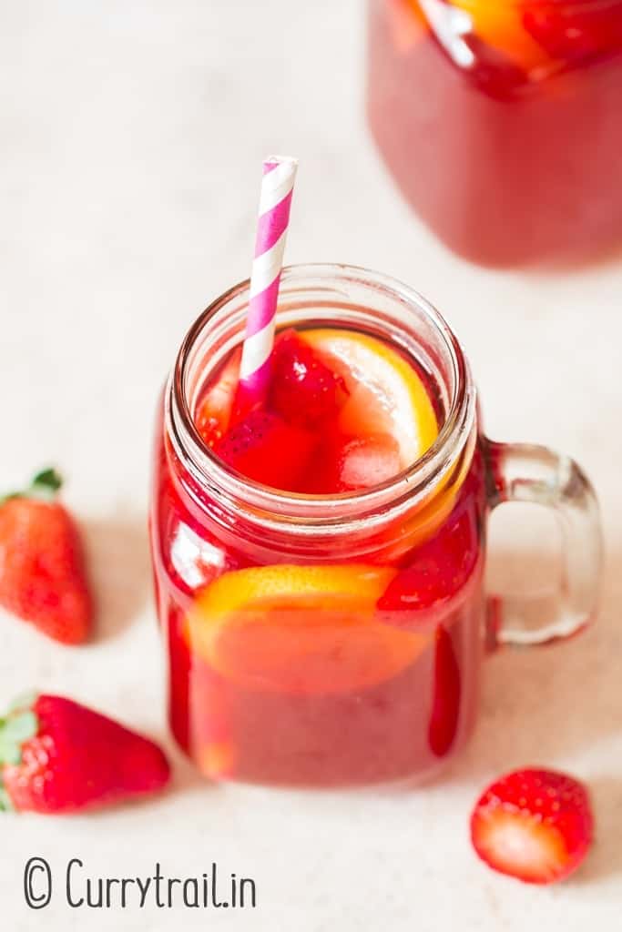 refreshing strawberry tea in mason jugs