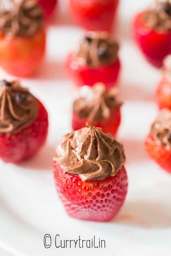 chocolate cheesecake stuffed inside strawberries