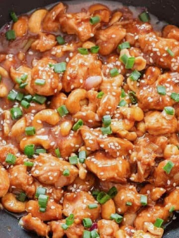 saucy cashew chicken cooked in a wok