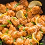 healthy Chinese lemon chicken cooked in a wok.