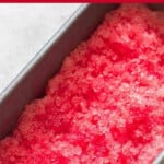 refreshing watermelon granita in a tray with text.