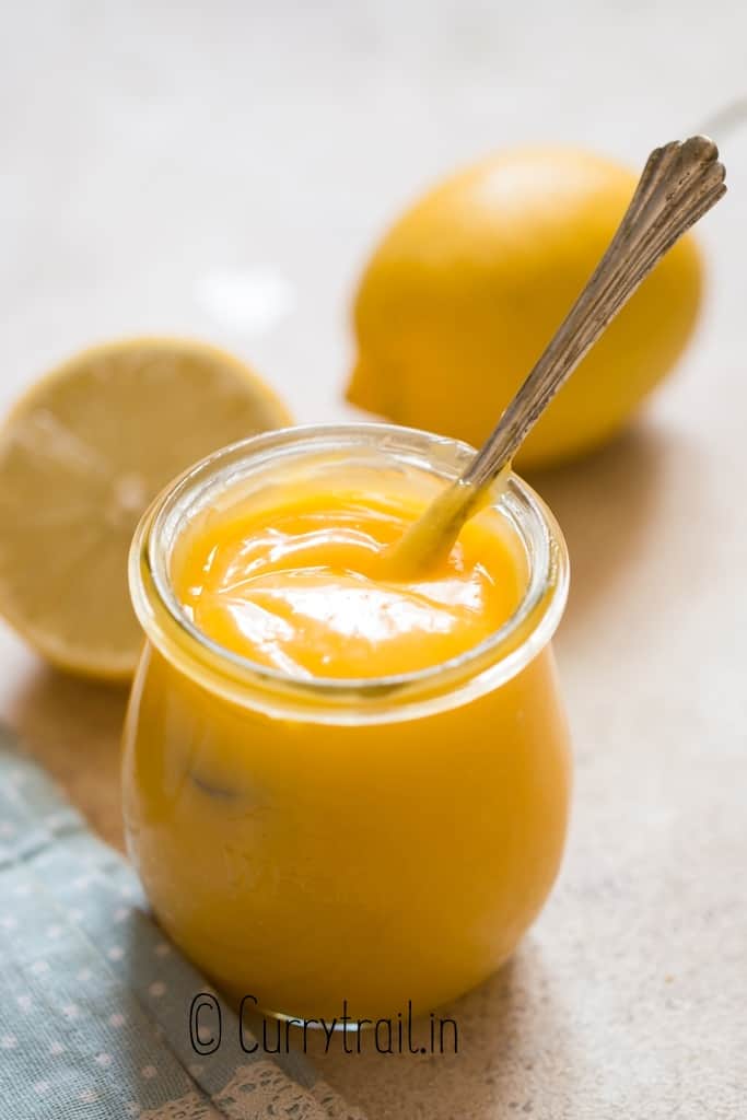 lemon curd in jar with spoon