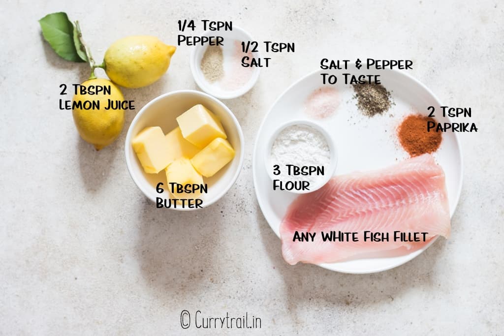 all ingredients for lemon butter sauce on white board
