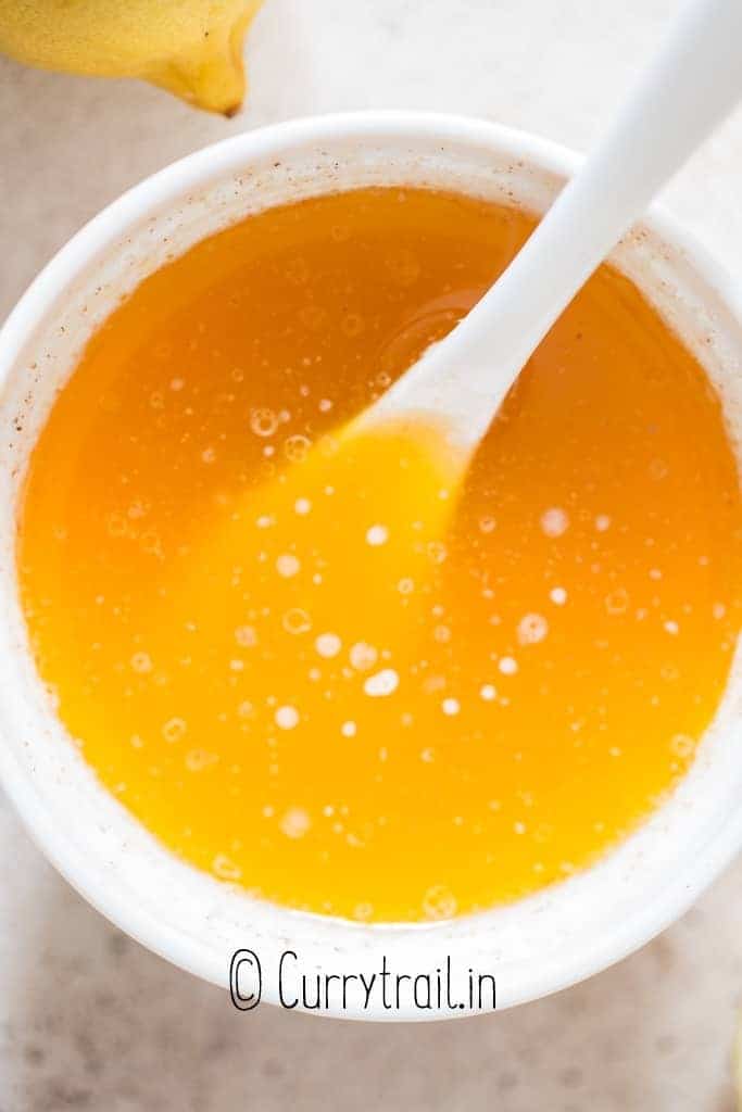 small bowl of rich lemon butter sauce