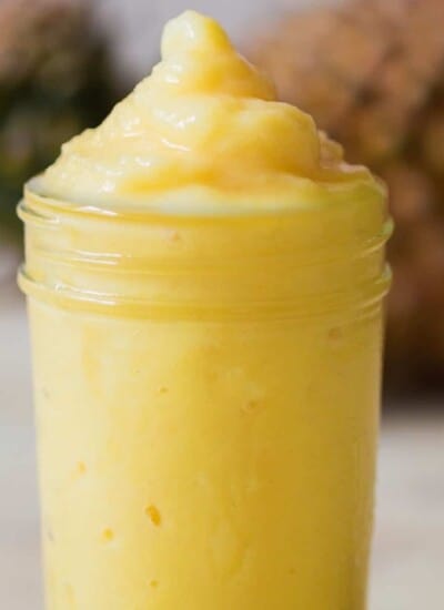 homemade pineapple soft serve dole whip in a glass jar.
