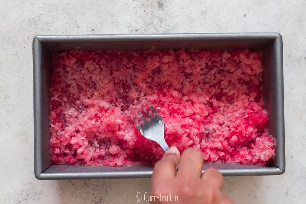 fresh watermelon granita in a tray.