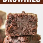 moist zucchini brownies stacked on top of each other with text overlay.