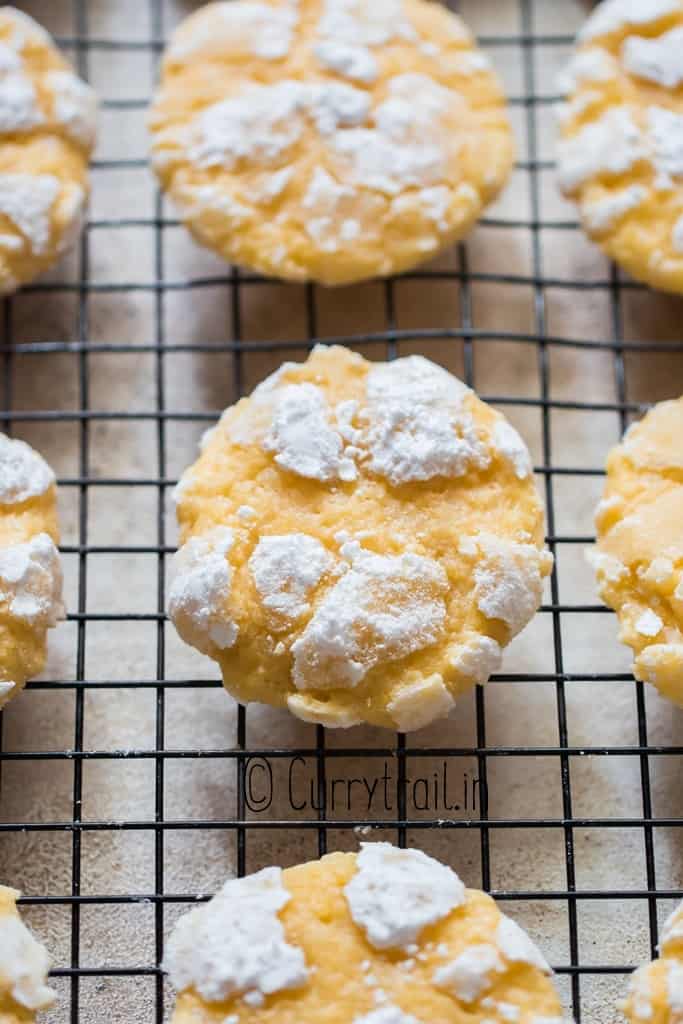 crinkled lemon cookies on wire rack