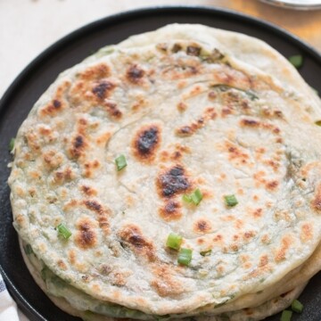 green onion pancakes stacked on each other