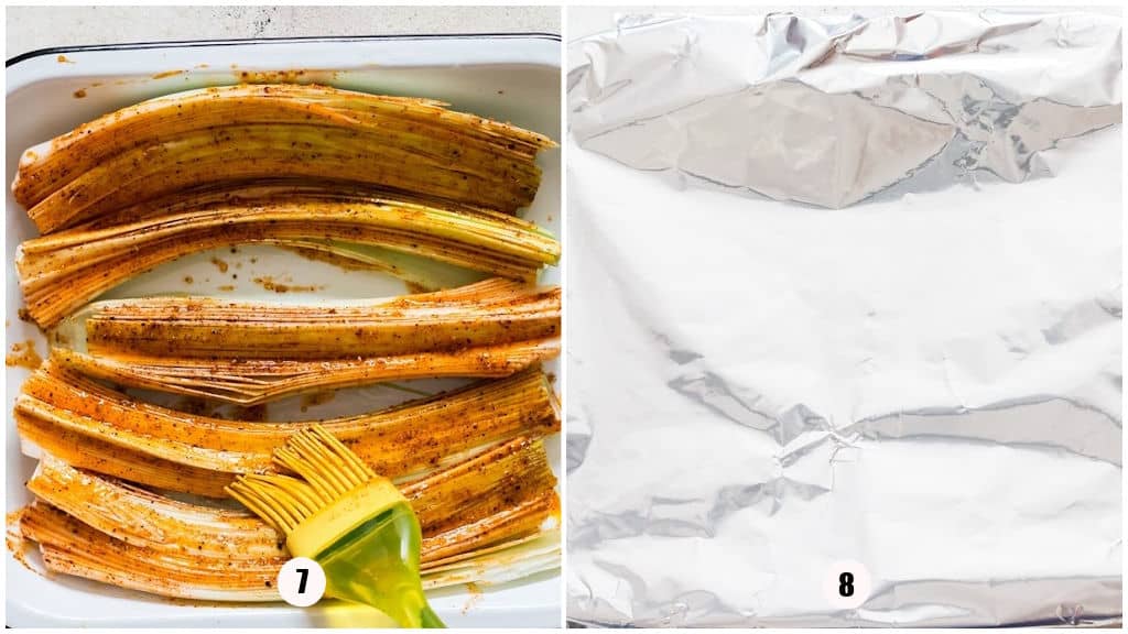 leeks rubbed with spice rub on a baking tray covered with aluminum foil.