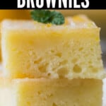 moist fudgy lemon brownies stacked up with mint leaves with text overlay