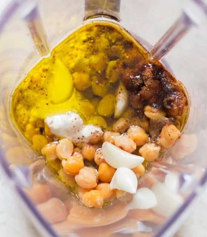 all ingredients of hummus are added to the blender.