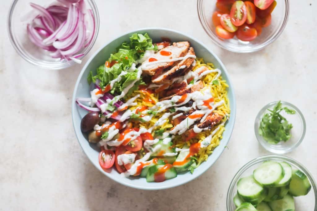 yellow rice and chicken shawarma in bowl