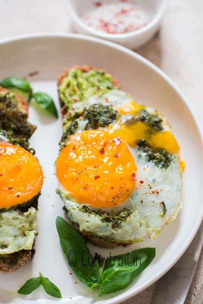 close up view of pesto egg avocado toast