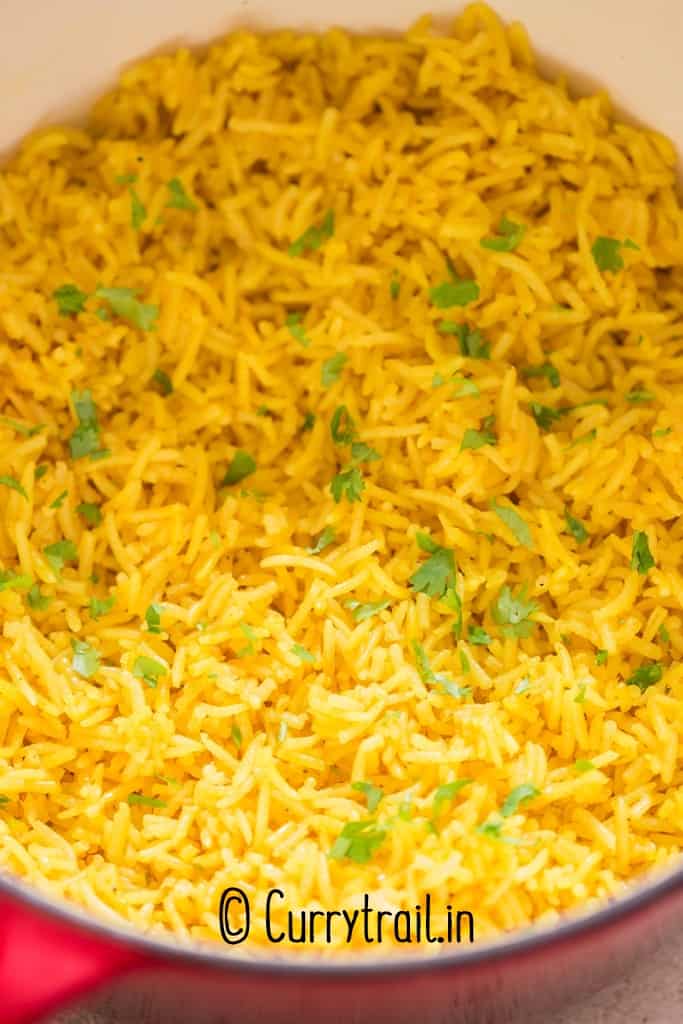 turmeric yellow rice in a pot.