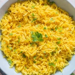 yellow rice in ceramic bowl