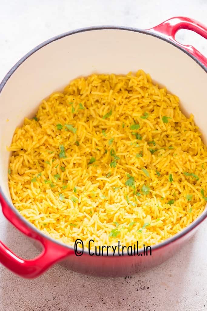 yellow rice cooked in pot