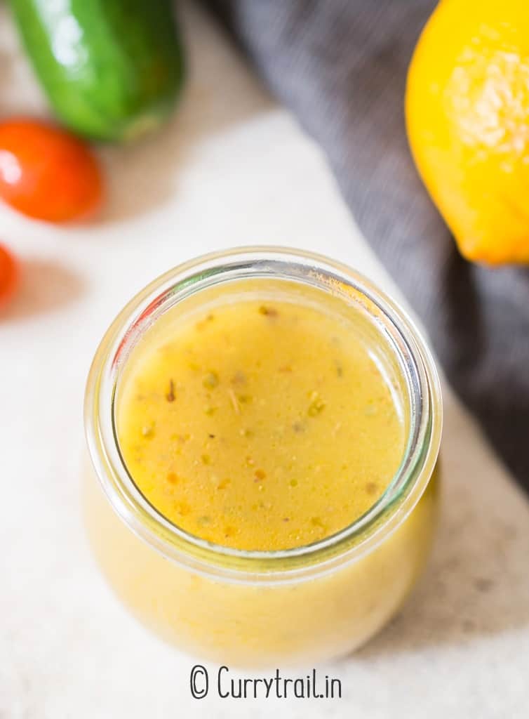 a jar of Greek style salad dressing