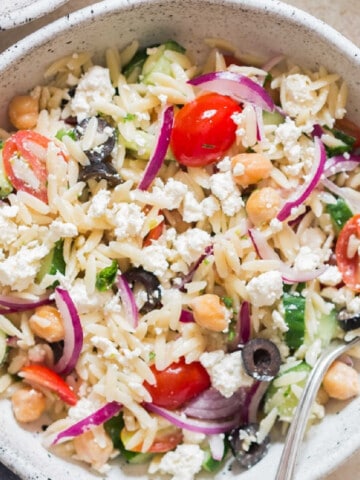 Greek orzo pasta salad in bowl