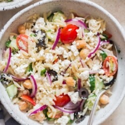 pasta salad made using orzo pasta and feta cheese