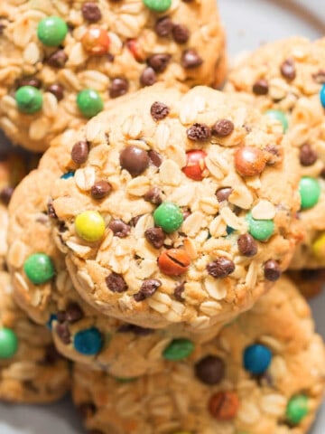 giant M&M studded monster cookies on plate