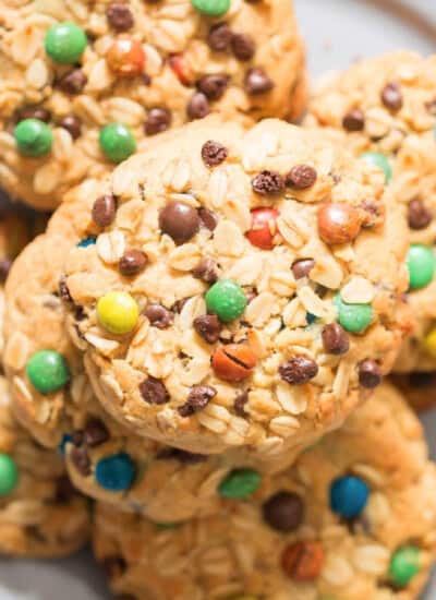 giant M&M studded monster cookies on plate
