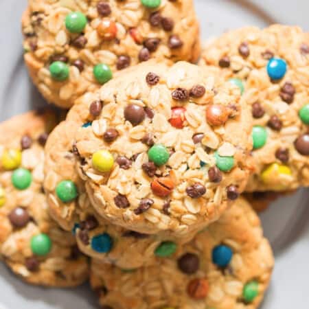 giant M&M studded monster cookies on plate