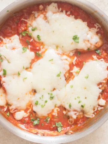 chicken with mozzarella in skillet