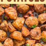 crispy parmesan crusted roasted potatoes with text