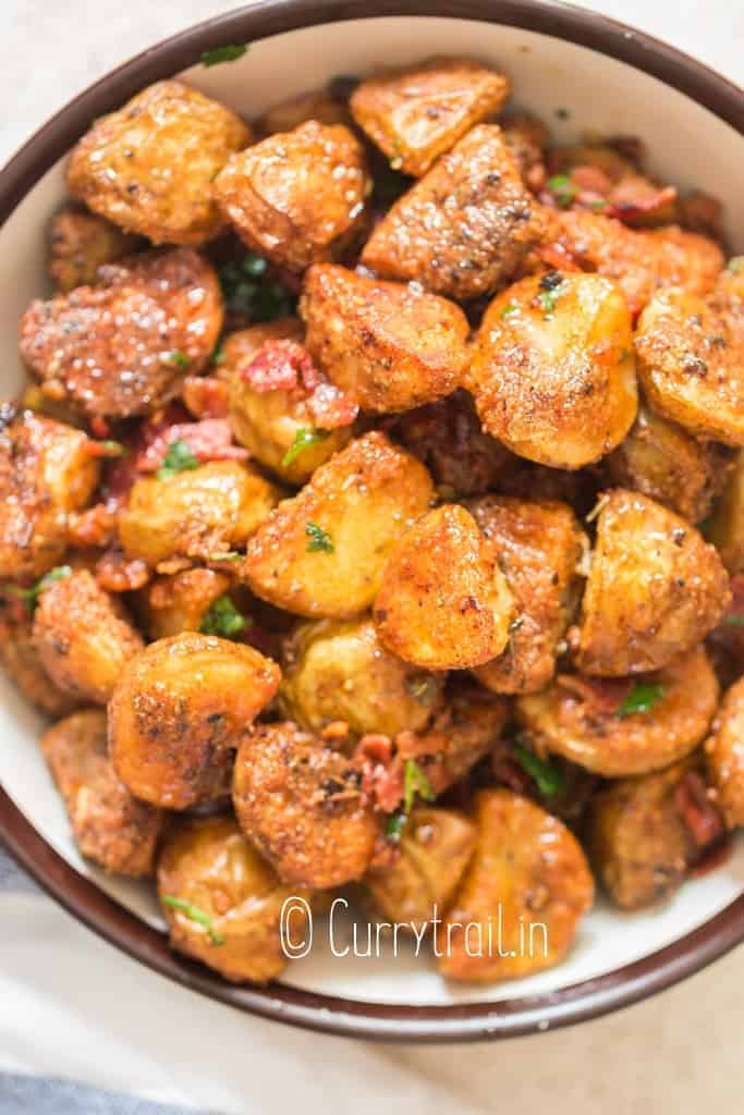 crispy parmesan potatoes roasted in bowl