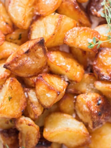 crunchy roast potatoes with thyme rosemary and sea salt