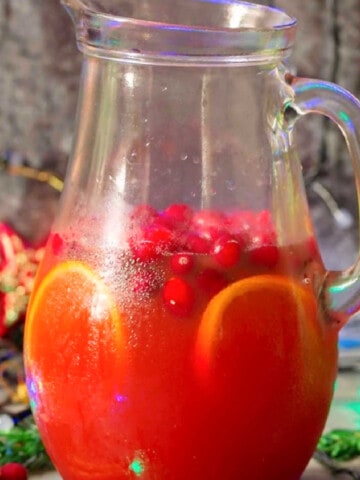 pitcher full of Christmas cranberry punch drink